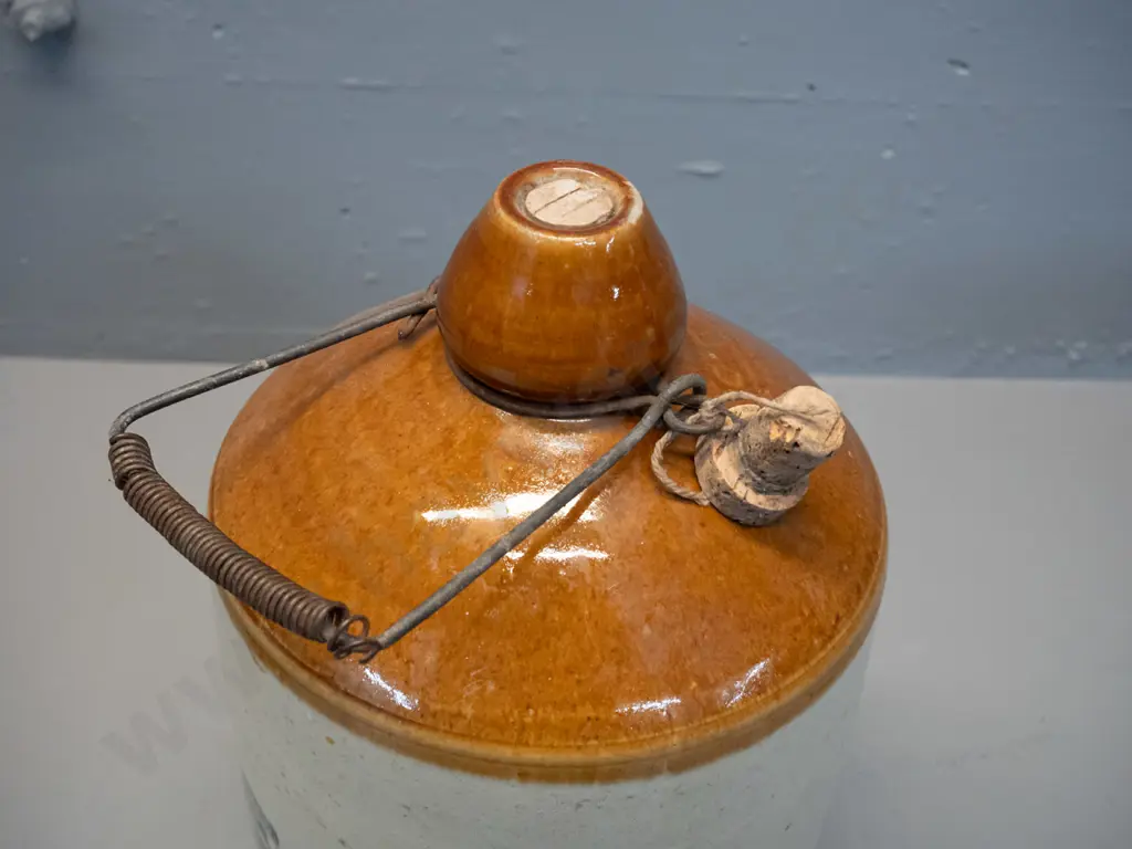 Neilson Vickers & Co Dunedin stoneware narrow-mouth crock with wire handle - hairline crack on front. H-340 D-200 Image 1++