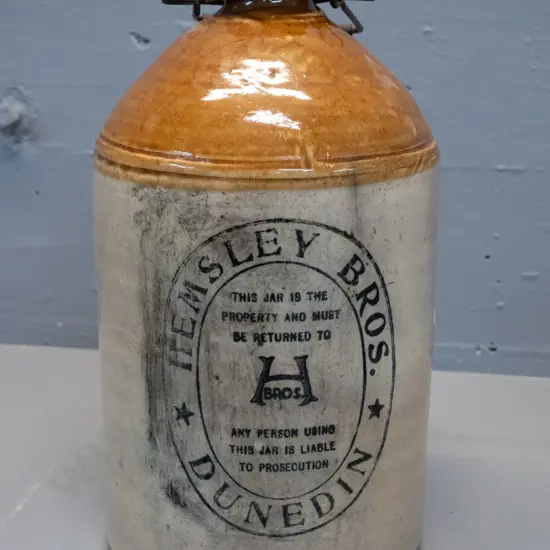 Hemsley Bros. Dunedin stoneware narrow-mouth crock with wire handle - has crazing and staining H-340 D-200