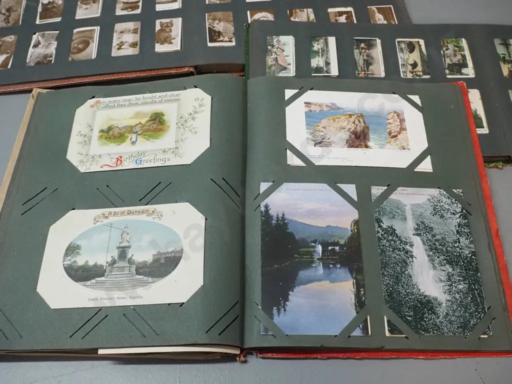 postcard album and 2 cigarette card collector's albums with assorted contents - postcards include Dunedin and other NZ Image 1++