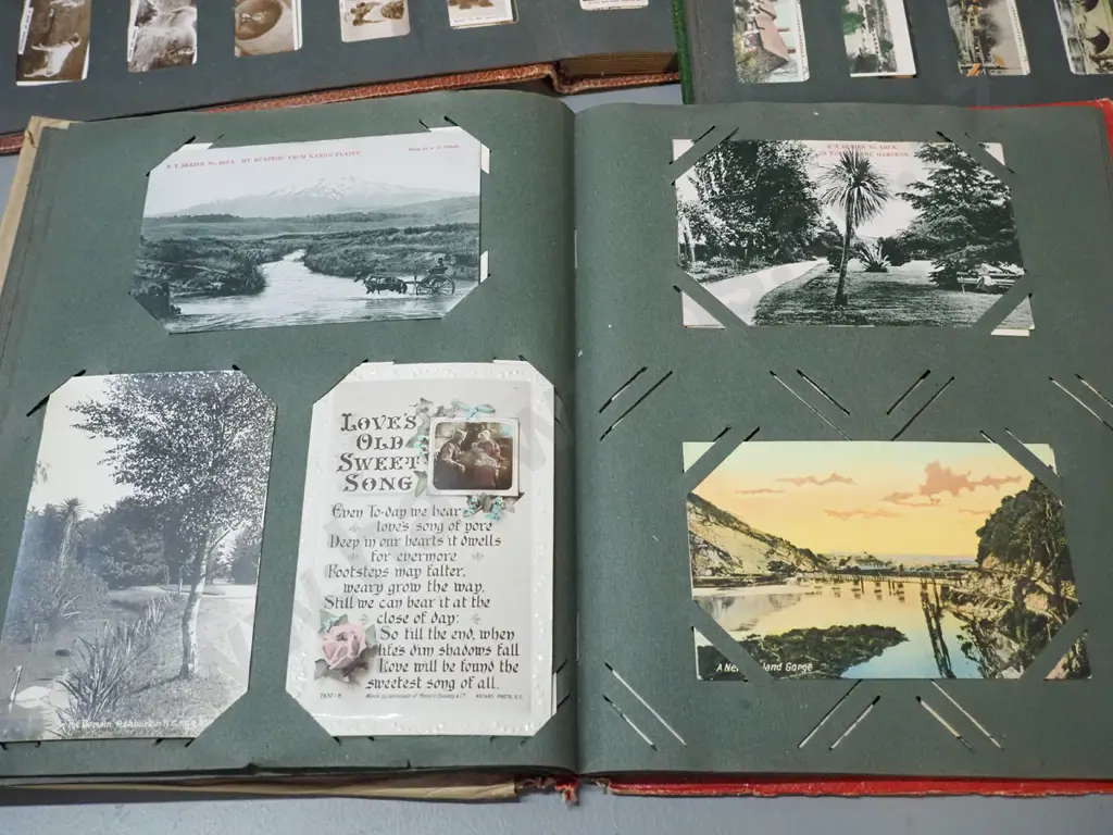 postcard album and 2 cigarette card collector's albums with assorted contents - postcards include Dunedin and other NZ Image 1++