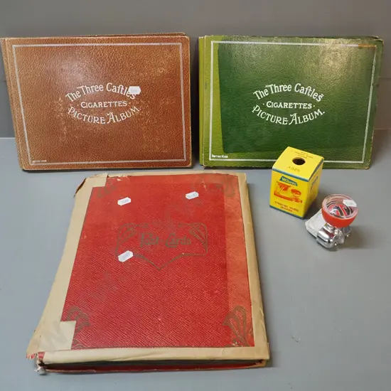postcard album and 2 cigarette card collector's albums with assorted contents - postcards include Dunedin and other NZ