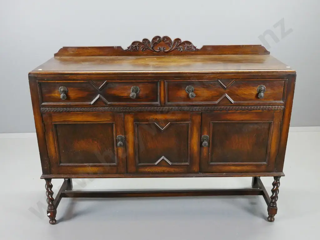 vintage oak Jacobean style sideboard with carved upstand, 2 drawers w/ drop handles, 2 cupboard doors, on stretcher base Image 1++