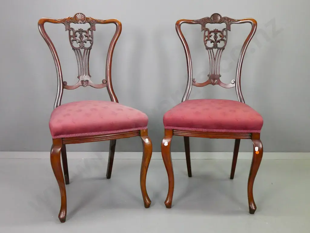 vintage pair walnut dining chairs with pierced slat back, carved shell decoration, cabriolet front legs. Slightly loose Image 1++
