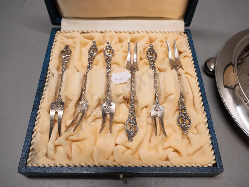 cased set of 6 Norwegian sterling silver pickle forks and an EPNS condiment set with 4 cut glass condiments Image 1++