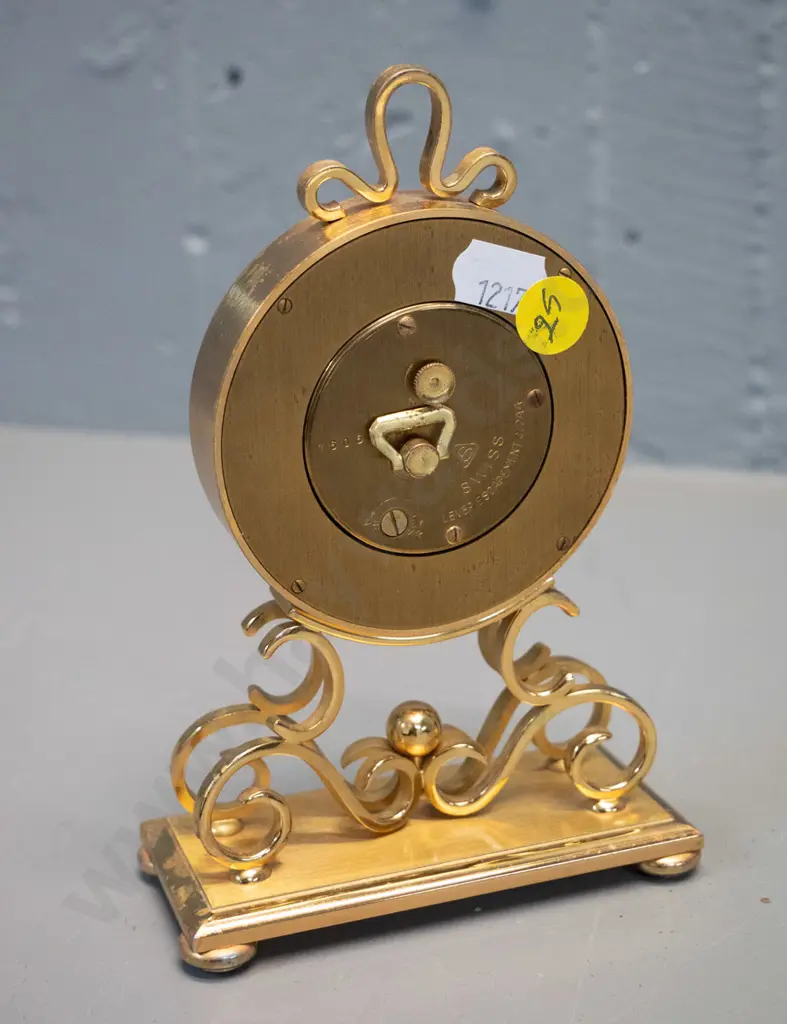 small Bucherer Swiss made brass cased clock with floral decoration on face - H-160 W-100 - some pitting or marking to Image 1++