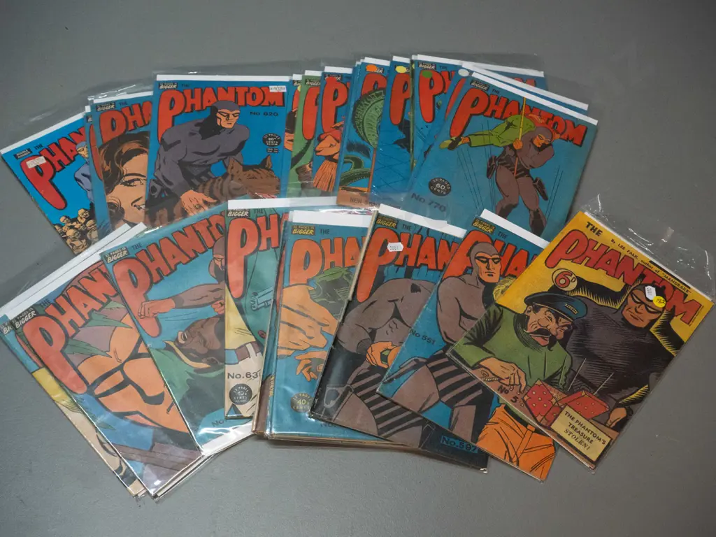 27 assorted Phantom comics - various reprints and reproductions etc, some have stickers, writing or stamps, first one is Image 1++