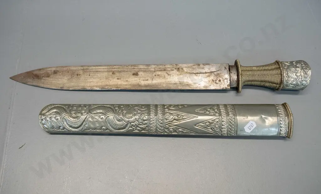 knife from Bhutan with hammered and woven metal handle, hammered dragon motif metal over timber sheath L470 Image 1++