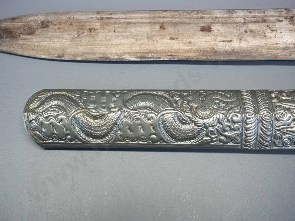 knife from Bhutan with hammered and woven metal handle, hammered dragon motif metal over timber sheath L470 Image 1++