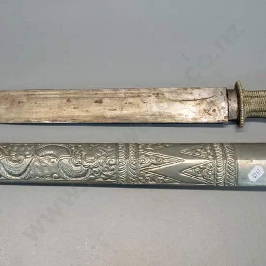knife from Bhutan with hammered and woven metal handle, hammered dragon motif metal over timber sheath L470