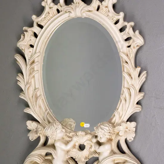 ornate composite cherub themed bevelled edge wall mirror H-790 W-420 (very slight paint loss on frame)