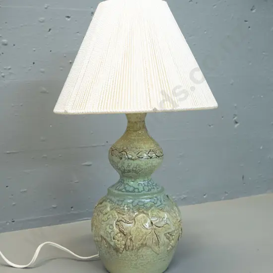 studio pottery table lamp with mottled pale green and blue glaze, applied grape leaf motifs, corded shade H-420 - has