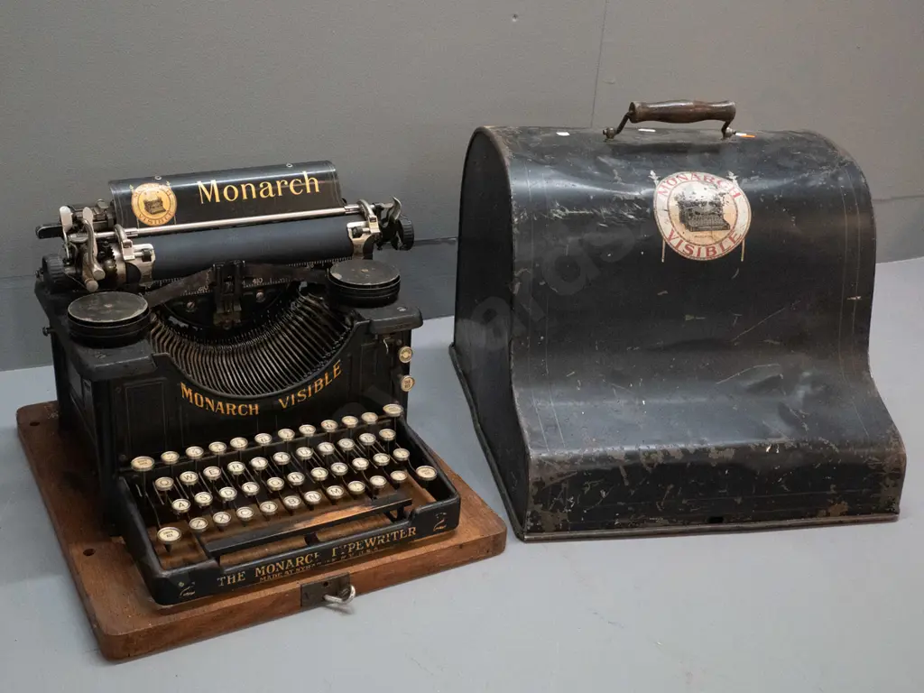 vintage Monarch Visible / Syracuse New York USA typewriter w/ metal cover & timber base which has some borer. Image 1++