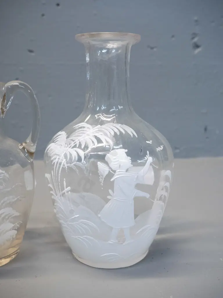 3 pieces of Mary Gregory style decorated clear glass - 2 jugs and a flask/decanter H-180 - fleck to rim of one jug Image 1++