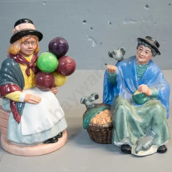 2 Royal Doulton figurines - seated balloon seller H-170 and woman feeding pigeons