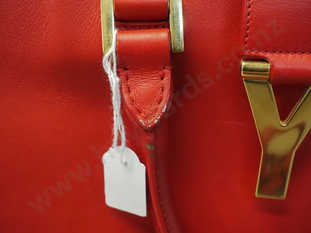 Yves Saint Laurent red leather hand bag with detachable strap - some wear and rubbing H-220 W300. NOT AUTHENTICATED Image 1++