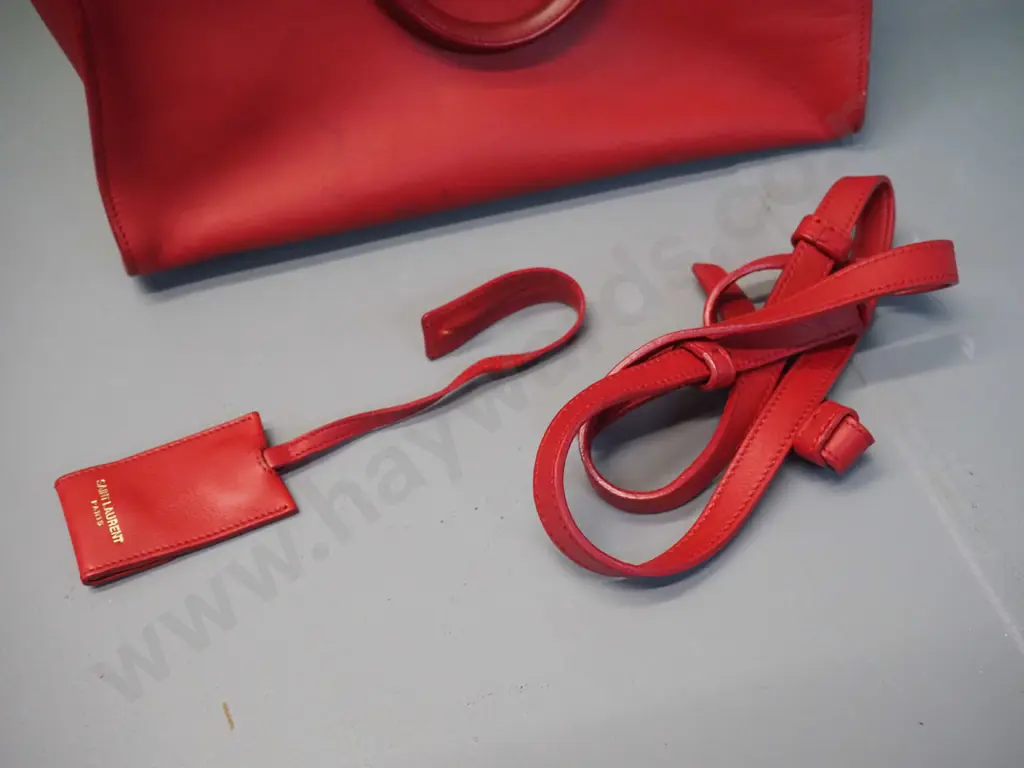 Yves Saint Laurent red leather hand bag with detachable strap - some wear and rubbing H-220 W300. NOT AUTHENTICATED Image 1++