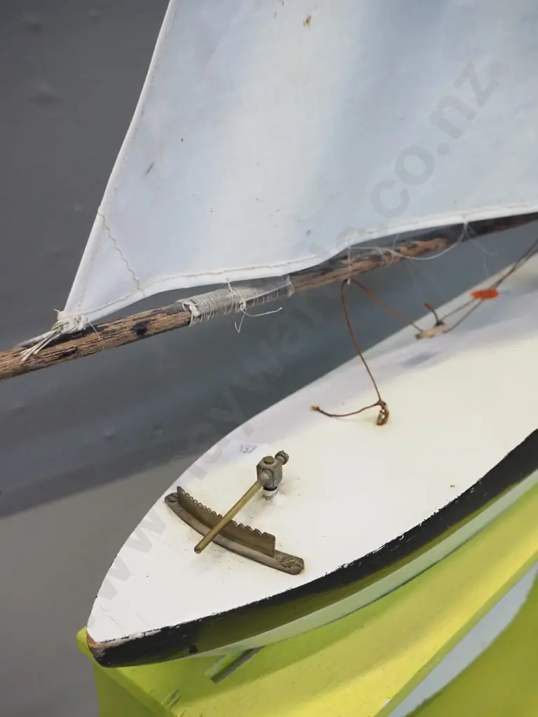 vintage pond yacht with sail and rigging, timber stand. Some wear and tear, a cut in one sail. L-550 H-700 in stand. Image 1++