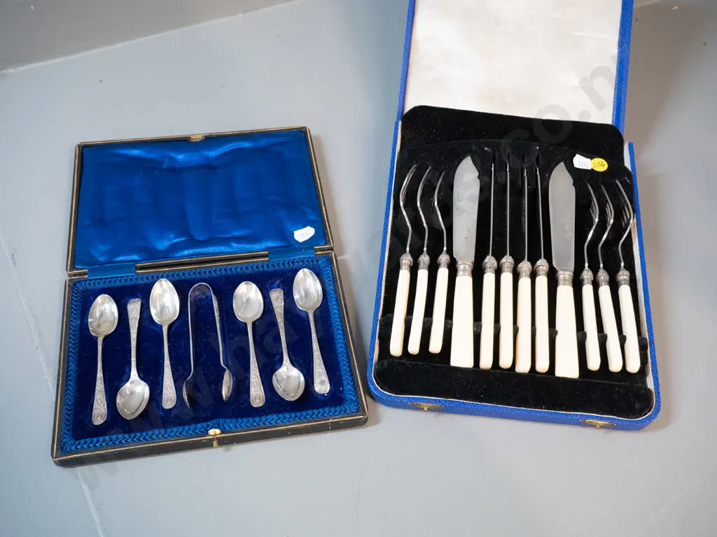 2 sets of plated cutlery - 6 bone handled fish knives and forks, and 6 teaspoons with sugar tongs Image 1++