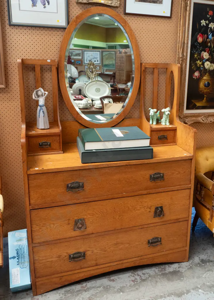 oak arts & crafts mirror-back dresser with oval bevelled mirror, 3 drawers in base, 2 small top drawers, mismatched drop Image 1++