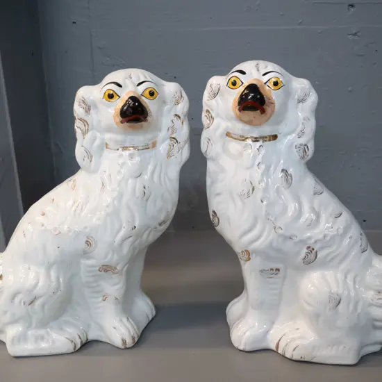 pair of Staffordshire dogs H-290 W-210