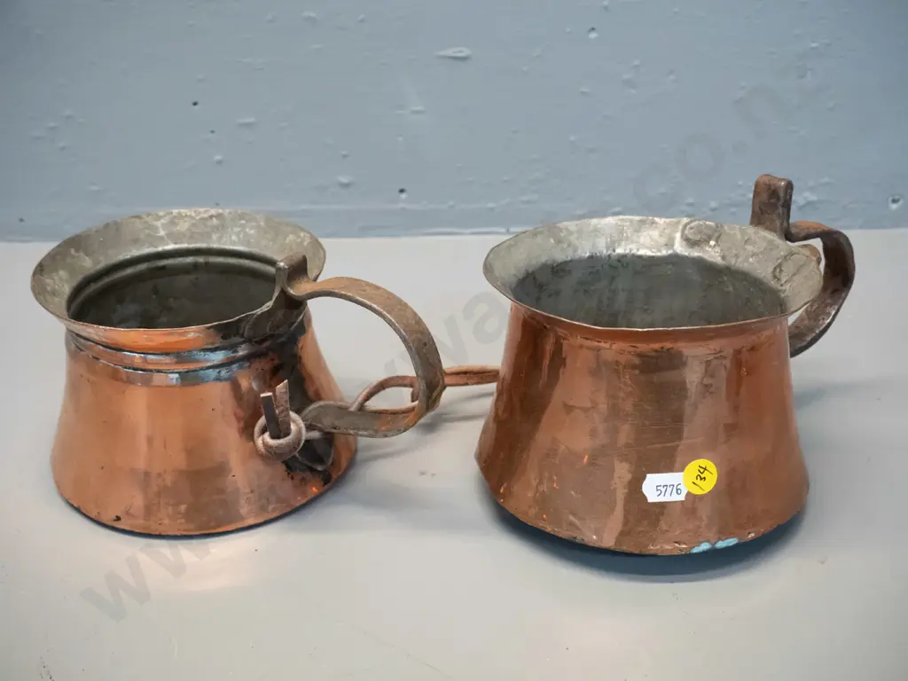 pair vintage copper plated jugs with rustic forged handles, joined with leather strap. Dents and corrosion, slightly Image 1++