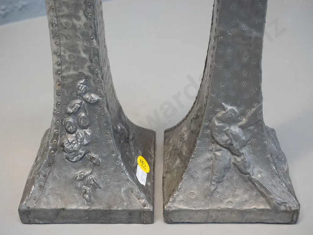 pair of vintage hand-beaten and decorated pewter candlesticks w/ bird and flower motifs, some damage to pewter at top Image 1++