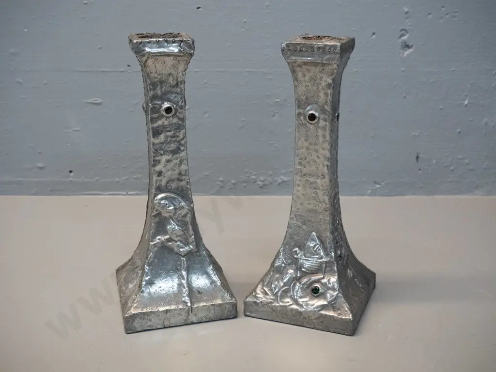 pair of vintage hand-beaten and decorated pewter candlesticks w/ bird and flower motifs, some damage to pewter at top Image 1++