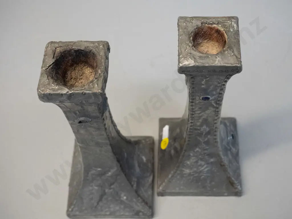 pair of vintage hand-beaten and decorated pewter candlesticks w/ bird and flower motifs, some damage to pewter at top Image 1++