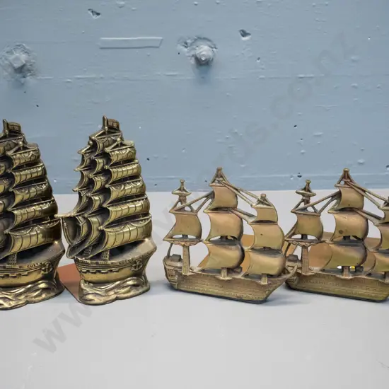 2 pair of brass sailing ship-themed book-ends - one pair marked Victory, other Cutty Sark H-180