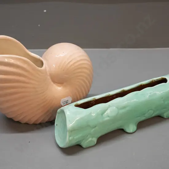 2 O.C. Stephens vases - pale green log trough and a pink-beige shell vase with crack at rim and some crazing,