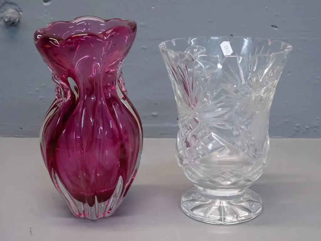 cranberry ribbed heavy art glass vase with floral motifs H-225 and a cut crystal footed vase Image 1++