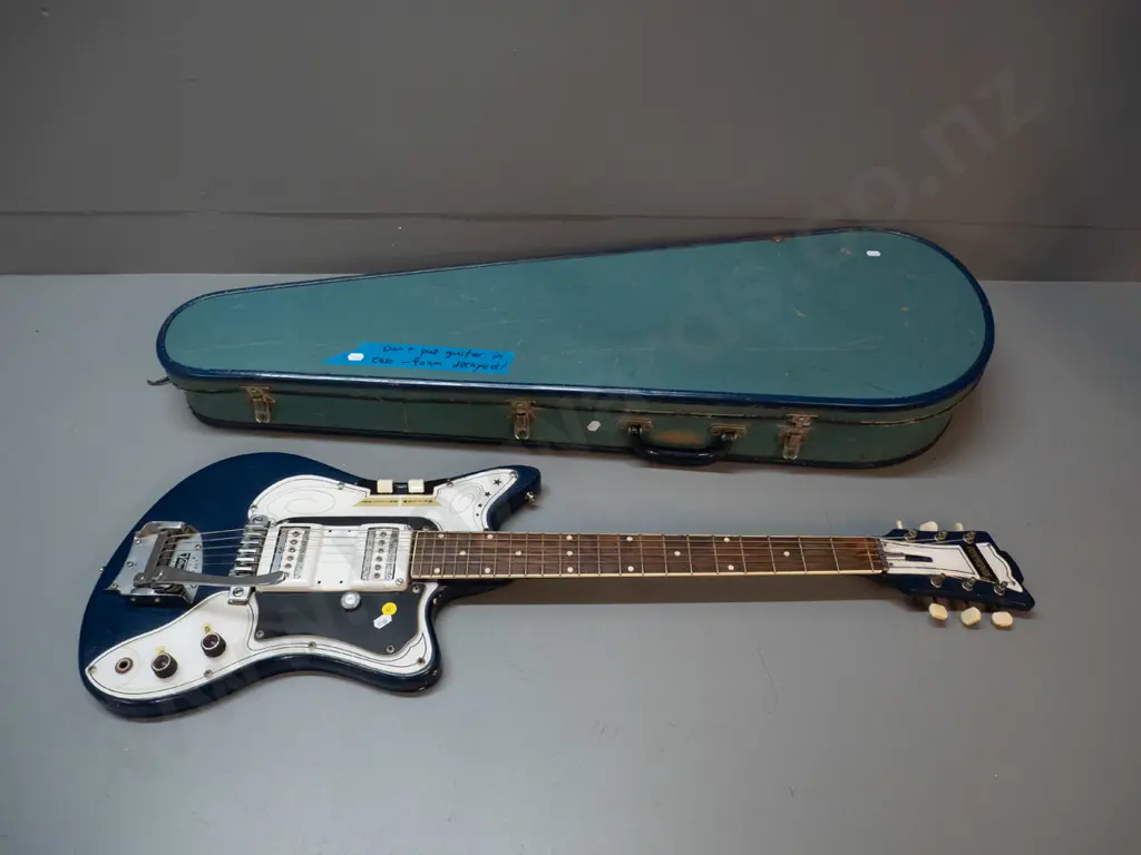 Commodore electric guitar and case, made in New Zealand circa 1962 according to note - with Vibratone. Foam inside gone Image 1++