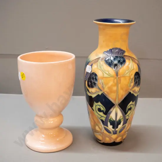 O.C. Stephens goblet with small chip to rim and a reproduction Moorcroft style relief pattern vase H-230