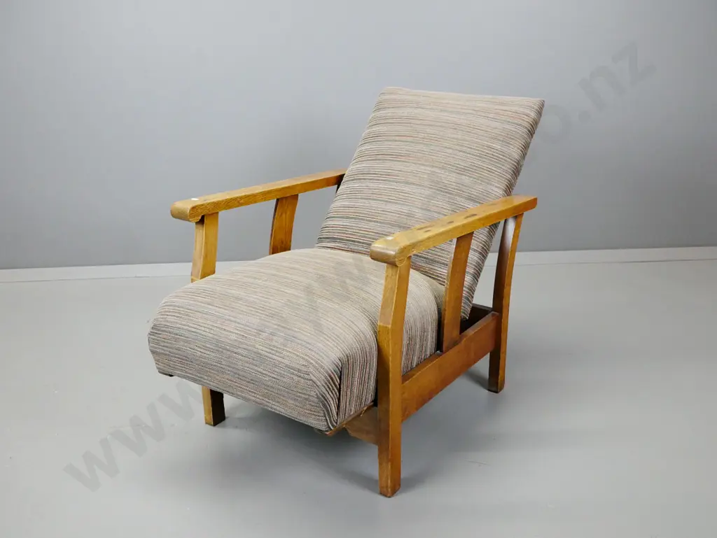 vintage oak Morris chair with sprung upholstered seat, brass adjustment bar to back. Some staining to polish on arms. Image 1++