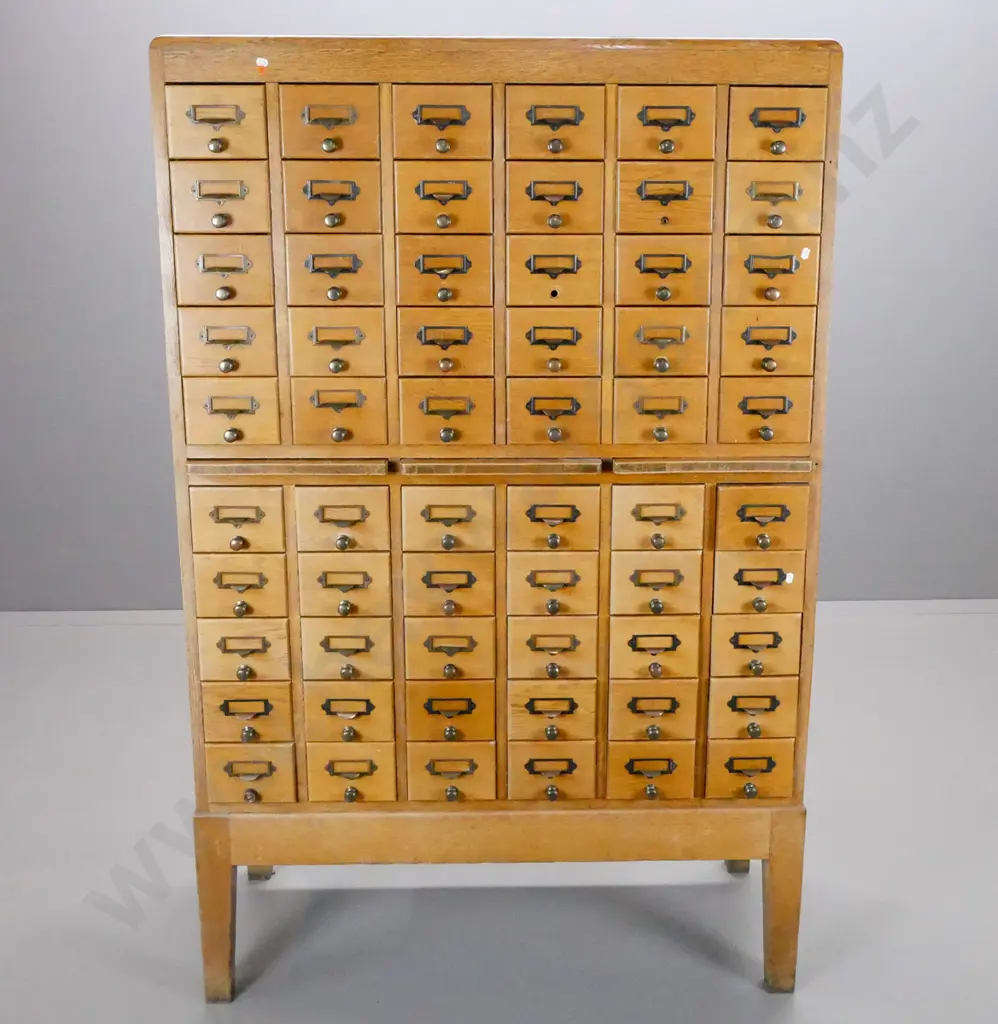 vintage large 60-drawer library file card cabinet with 3 writing slides in centre, paneled sides and back, on square Image 1++