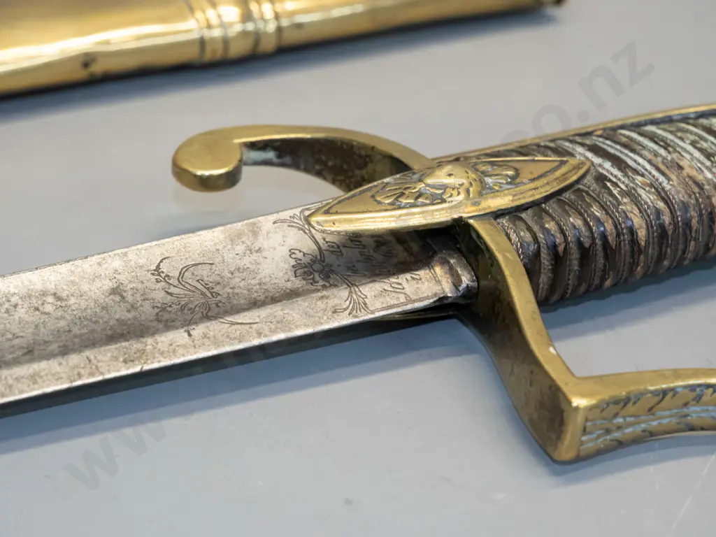 vintage decorative sword with cast brass lion's head, timber and plaited metal cord handle, brass scabbard, some hard to Image 1++