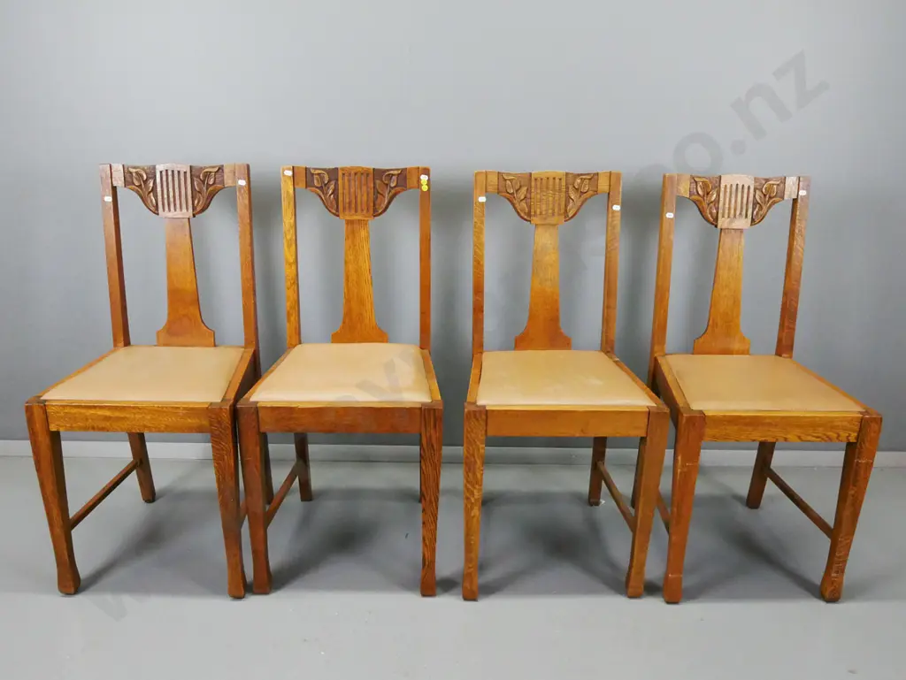 4 arts & crafts style oak splat back dining chairs with carved lily motifs, square tapered legs, brown vinyl pop-out Image 1++