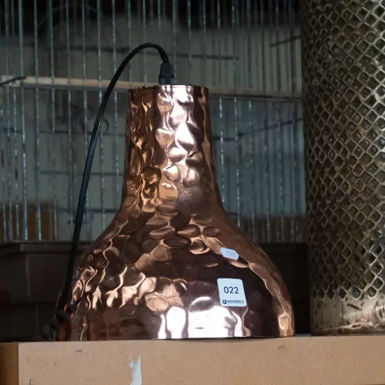 beaten copper hanging light fitting