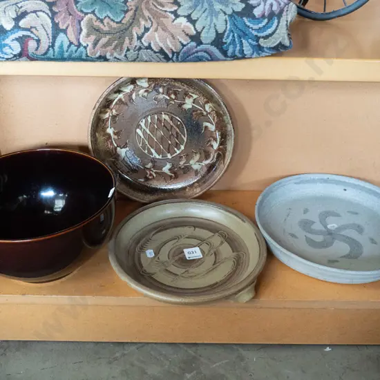 shelf of studio pottery bowls