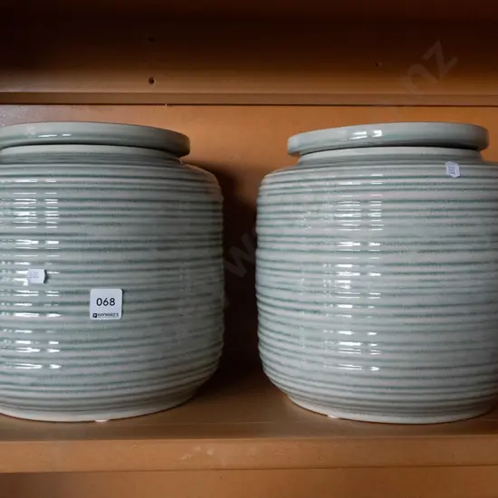 2 large lidded storage canisters H-250
