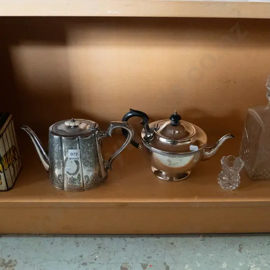 Tiger tea tin, plated teapots, decanter, 2 cut crystal candlesticks