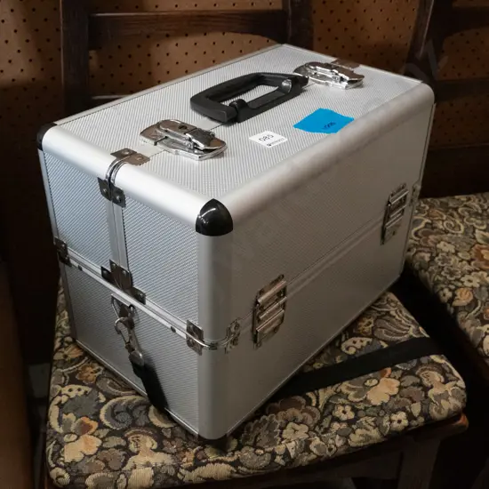 hard equipment case with concertina mechanism storage trays