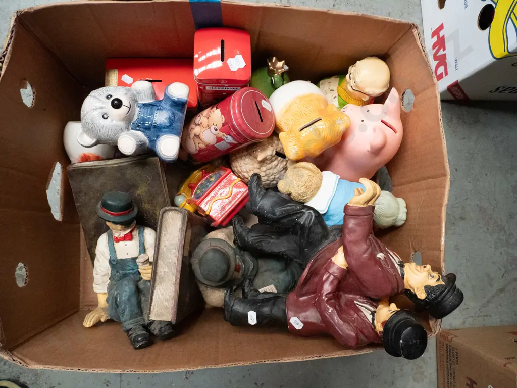 box of Laurel & Hardy figurines and book-ends, piggy banks, tins, etc Image 1++