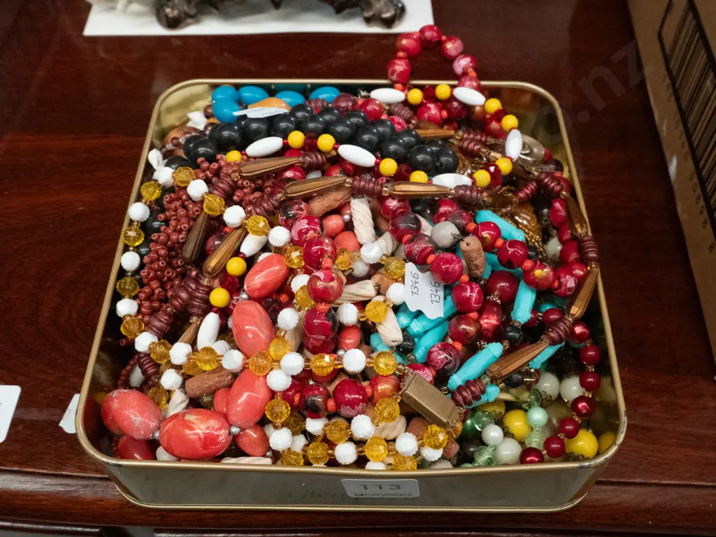 tin of costume jewellery Image 1++