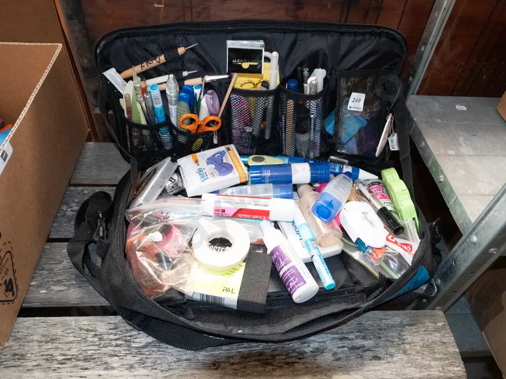 crafter's bag with assorted craft supplies Image 1++