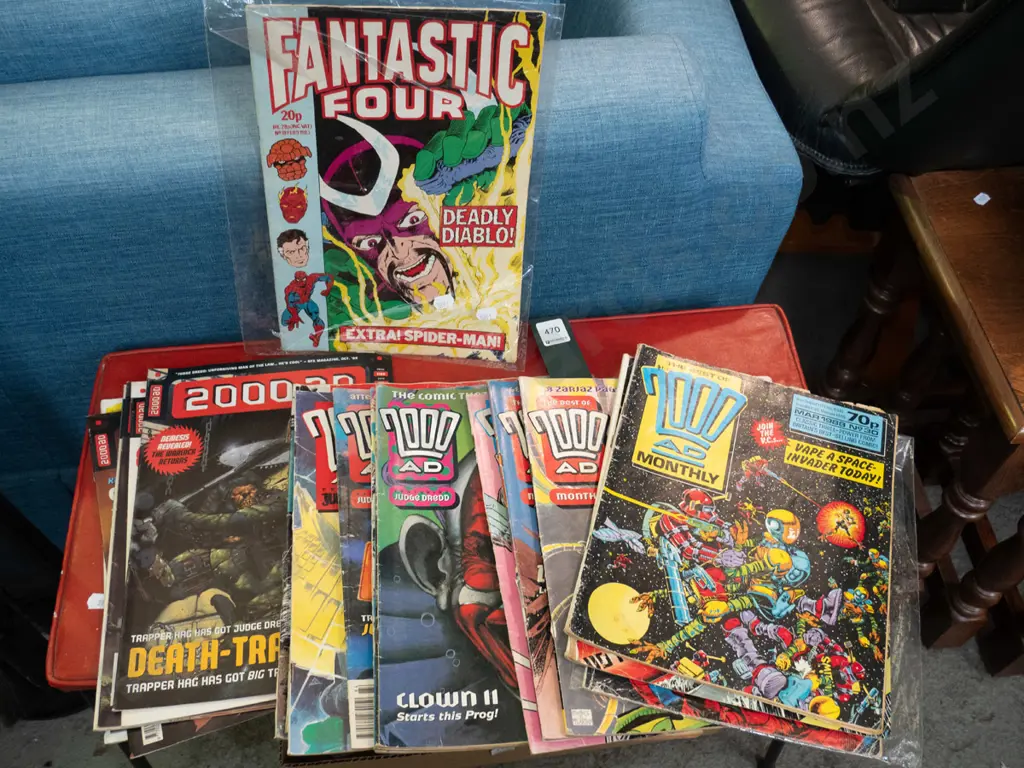 stack of comics Image 1++