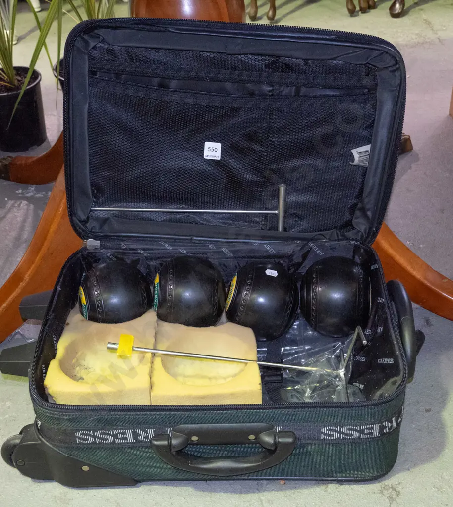 suitcase and lawn bowls Image 1++