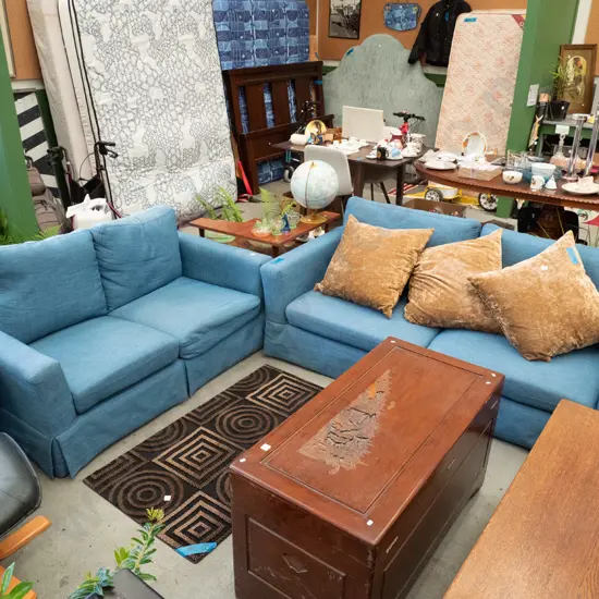 2 piece blue lounge suite - 3 seater, 2 seater settee - some fading