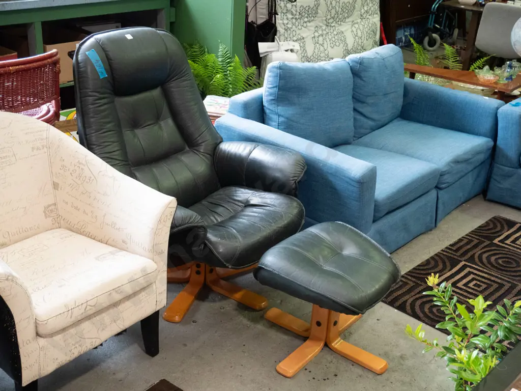 dark green vinyl swivel armchair and stool -some damage to upholstery Image 1++