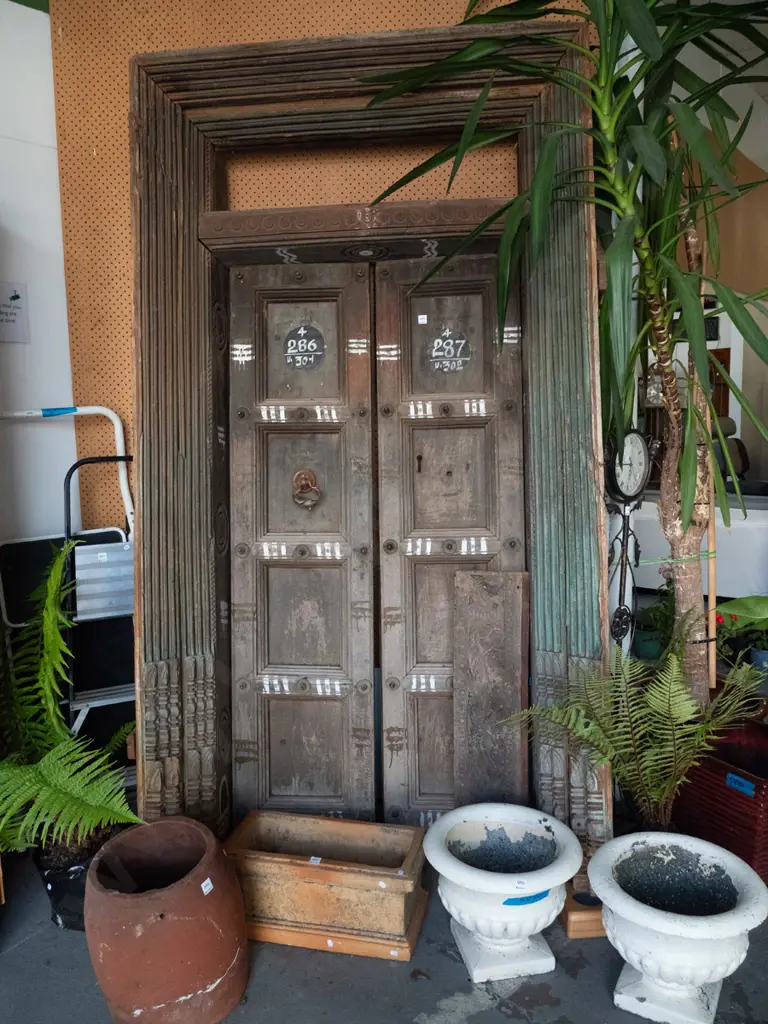 heavy Indian Madurai carved hardwood entrance door - 2 doors, cast metal drop handle, metal studding Image 1++